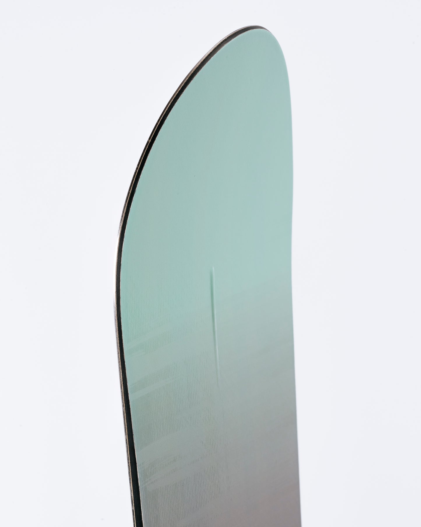 The nose of freeride womens snowboard with HotRod technology visible. Muse 2025 | Rome Snowboards™